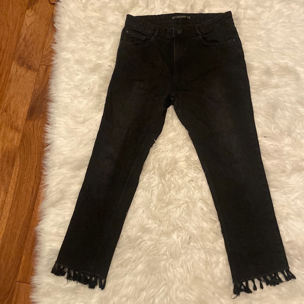 black fringe bottom jeans
